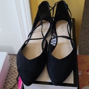 Black suede flats